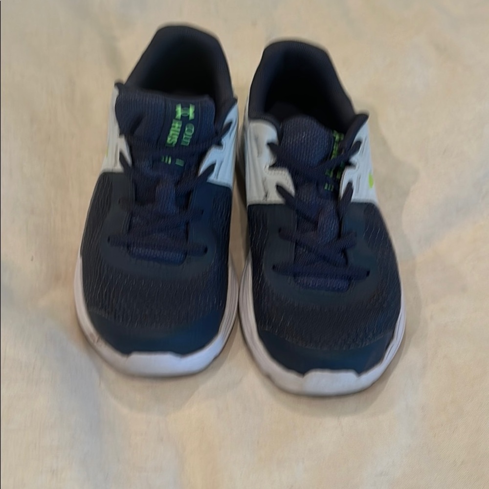 Gently worn kids under armor sneakers